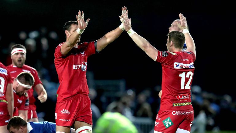 Scarlets players celebrate their semi-final victory over Leinster in the Guinness PRO12 