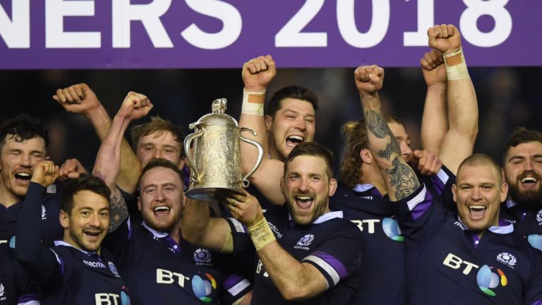 Scotland celebrate with the  Calcutta Cup  after victory against England