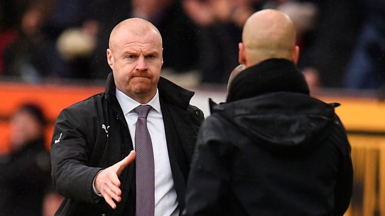 Sean Dyche shakes hands with Pep Guardiola at full time