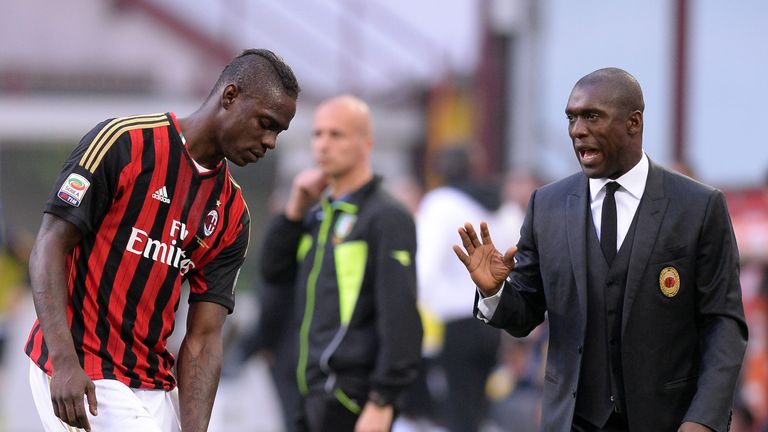 MILAN, ITALY - MARCH 16:  Head coach AC Milan Clarence Seedorf (R) and Mario Balotelli talk during the Serie A match between AC Milan and Parma FC at San S