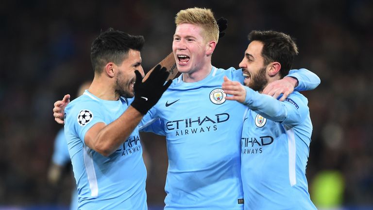 Sergio Aguero, Kevin De Bruyne and Bernardo Silva celebrate a goal against FC Basel in the UEFA Champions League Round of 16 First Leg