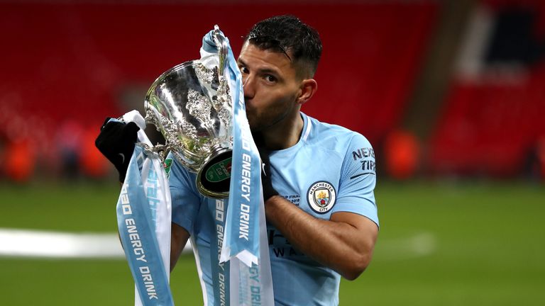 Sergio Aguero celebrates with Carabao Cup on the Wembley pitch