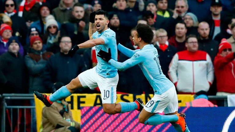 Sergio Aguero celebrates with Leroy Sane after giving Manchester City a 1-0 lead in the Carabao Cup Final