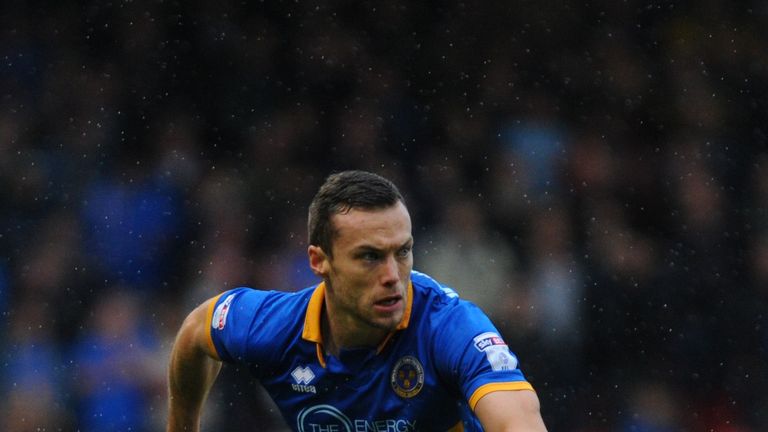 WALSALL, ENGLAND - OCTOBER 07: Shaun Whalley of Shrewsbury Town in action during the Sky Bet League One match between Walsall and Shrewsbury Town at Banks'