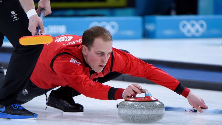 Britain's Kyle Smith throws the stone during the curling men's round robin session between Britain and the US during the Pyeongchang 2018 Winter Olympic Ga