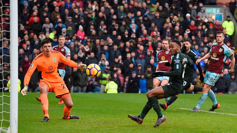 Manchester City's English midfielder Raheem Sterling sends a shot wide to miss a chance during the English Premier League football match between Burnley an
