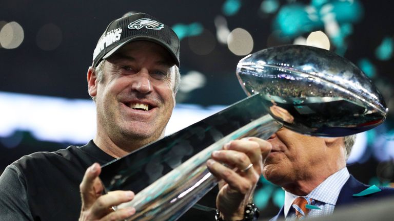 Philadelphia Eagles Head coach Doug Pederson holds the Vince Lombardi Trophy aloft after defeating the New England Patriots in Super Bowl LII