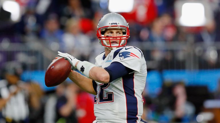 Tom Brady warms up prior to Super Bowl LII against the Philadelphia Eagleas at U.S. Bank Stadium