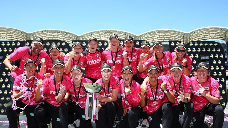 The Sydney Sixers pose with the troophy after winning  the Women's Big Bash League final