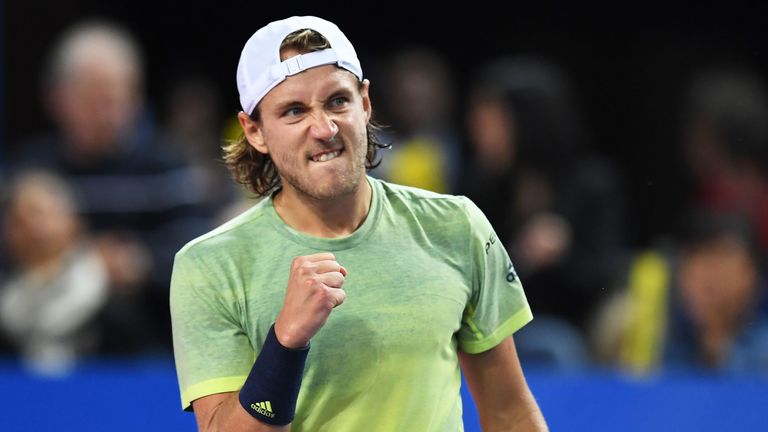 France's tennis player Lucas Pouille reacts after winning the final of the ATP World Tour Open Sud de France in Montpellier