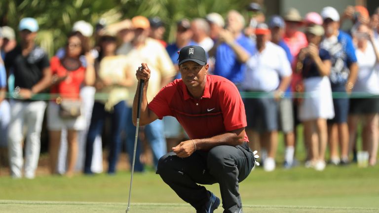 PALM BEACH GARDENS, FL - FEBRUARY 25: Tiger Woods lines up his putt on the second green during the final round of the Honda Classic at PGA National Resort 