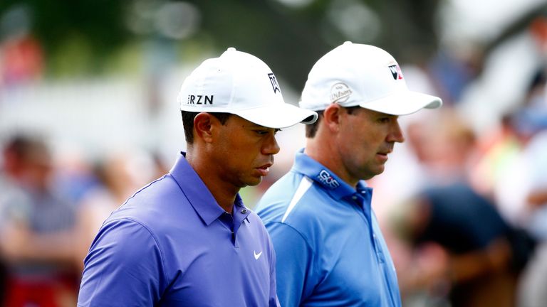 LOUISVILLE, KY - AUGUST 07:  (L-R) Tiger Woods of the United States and Padraig Harrington of Ireland walk together up the 17th hole during the first round