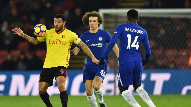 Watford Troy Deeney (L) vies with Chelsea defender David Luiz (C)
