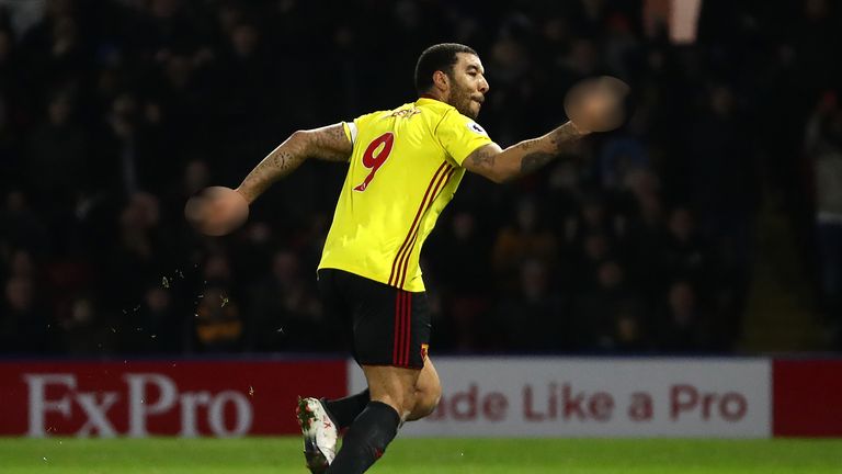 Troy Deeney gestures toward fans after putting Watford ahead at Vicarage Road