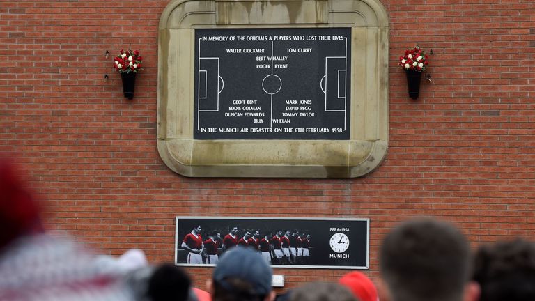 Supporters attend a commemoration service at the permanent memorial for the 1958 Munich Air Disaster ahead of the 60th anniversary of the crash that claime