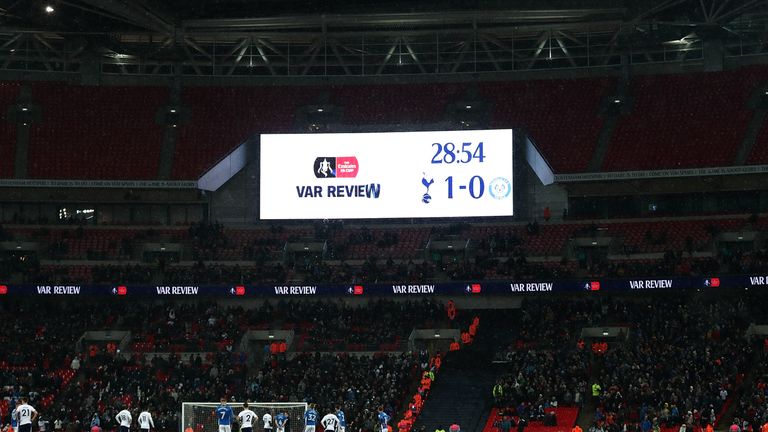 A decision is reviewed by VAR during FA Cup fifth round replay between Tottenham and Rochdale
