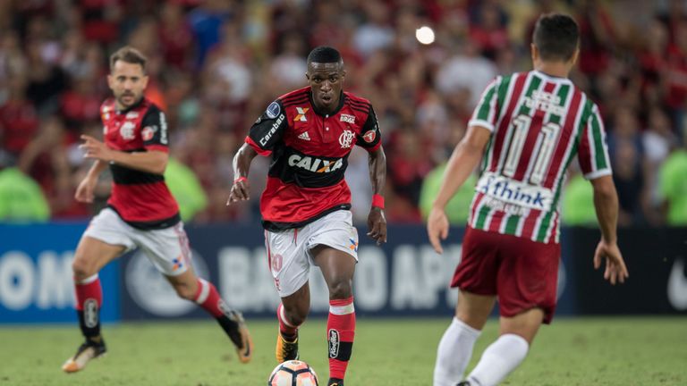 Brazil's Flamengo player Vinicius Jr (L) vies for the ball with Brazil's Fluminense player Marlon (R) during their 2017 Sudamericana Cup football match at 