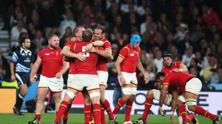 Wales celebrate after the 28-25 victory over England