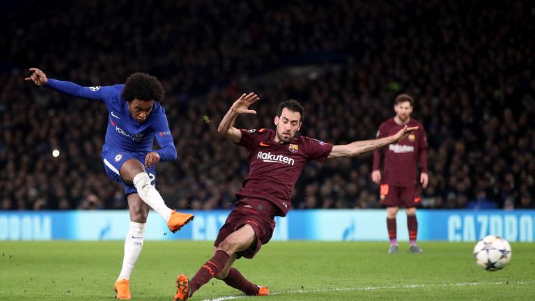 Chelsea's Willian (left) scores his side's first goal of the game during the UEFA Champions League round of sixteen, first leg match at Stamford Bridge, Lo