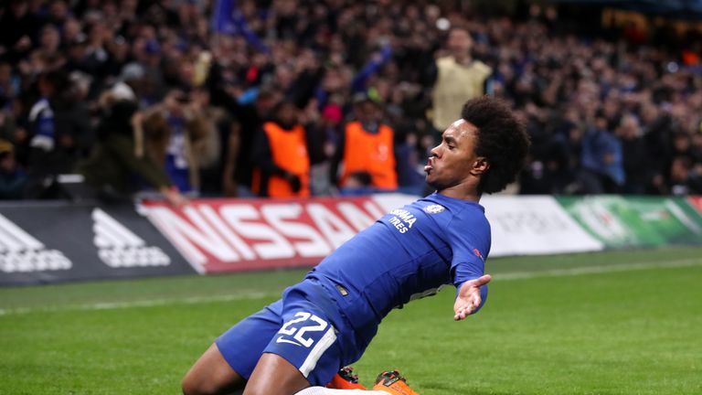 Chelsea's Willian celebrates scoring his side's first goal of the game during the UEFA Champions League round of sixteen, first leg match at Stamford Bridg