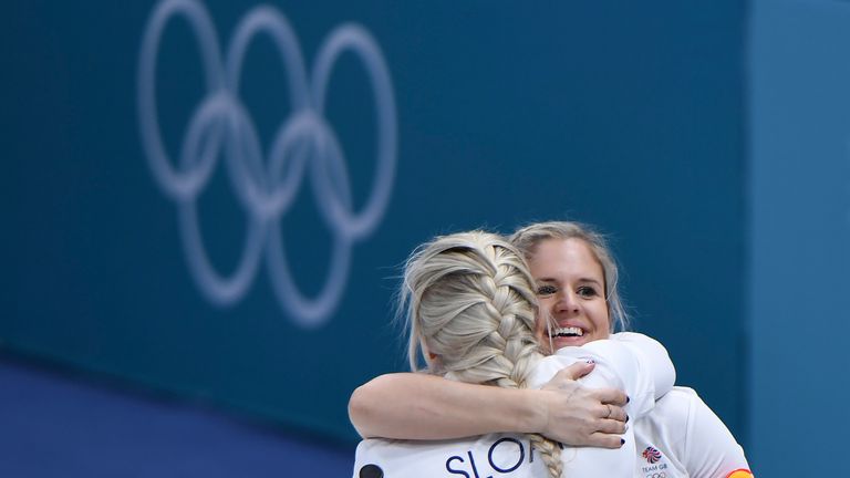 Britain's Vicki Adams celebtates with Anna Sloan after winning the curling women's round robin session between Canada and Britain during the Pyeongchang 20