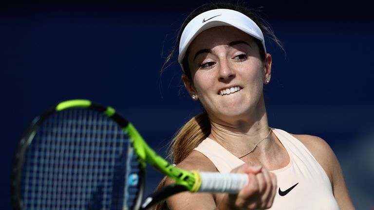 Catherine Bellis of USA plays a forehand against Elise Mertens of Belgium during day two of Dubai