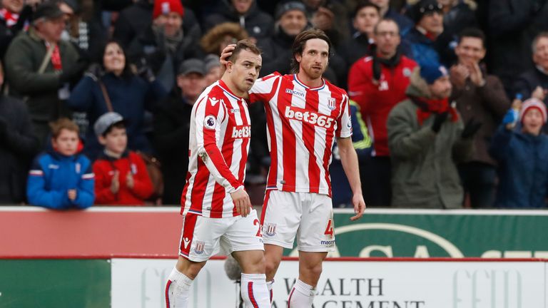 Stoke City's Xherdan Shaqiri celebrates his equaliser with Joe Allen