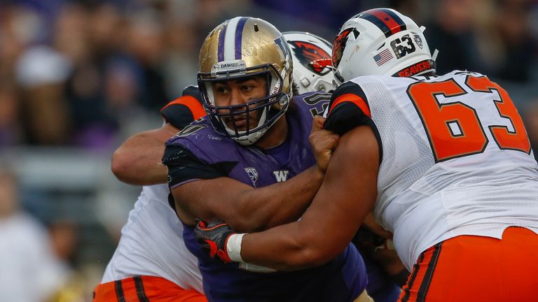 SEATTLE, WA - OCTOBER 22:  Defensive lineman Vita Vea #50 of the Washington Huskies battles guard Gus Lavaka #63 of the Oregon State Beavers on October 22,