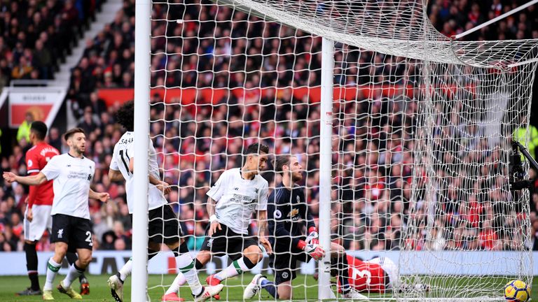 David de Gea picks the ball out of his net after being beaten by Eric Bailly