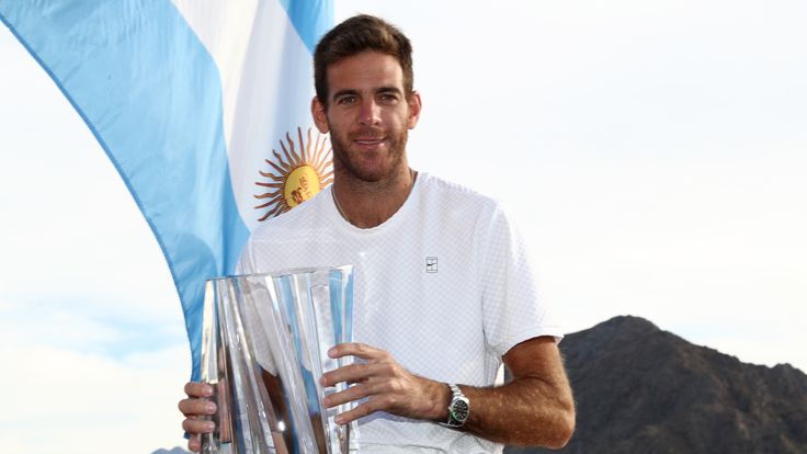 Juan Martin del Potro of Argentina poses with the winner's trophy after defeating Roger Federer of Switzerland during the men's final on Day 14 of the BNP Paribas Open at the Indian Wells Tennis Garden on March 18, 2018 in Indian Wells, California.