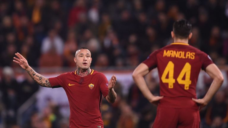 Radja Nainggolan gestures to a Roma team-mate