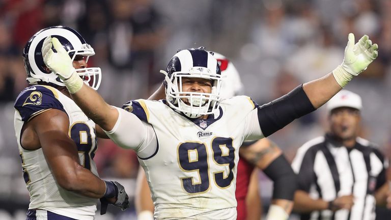 Aaron Donald #99 of the Los Angeles Rams celebrates a sack
