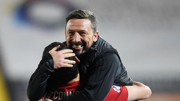 Aberdeen manager Derek McInnes with Graeme Shinnie (left)