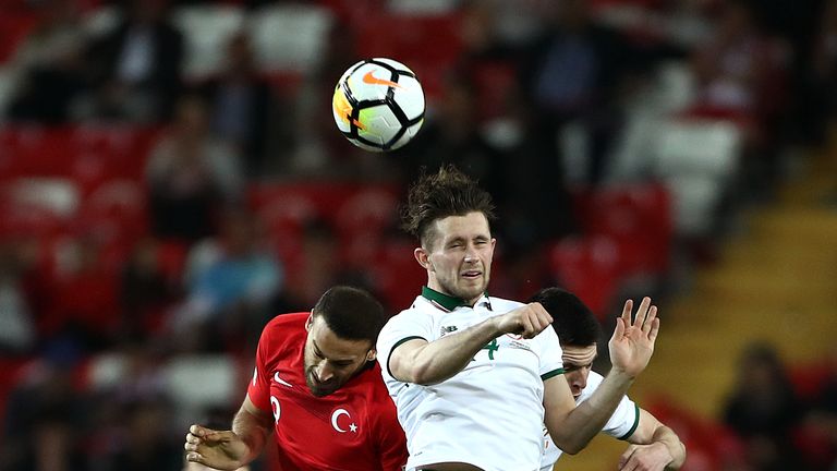 Republic of Ireland's Alan Browne (right) and Turkey's Cenk Tosun (left) battle for the ball during the international friendly match at the Antalya Stadium. PRESS ASSOCIATION Photo. Picture date: Friday March 23, 2018. See PA story SOCCER Turkey. Photo credit should read: Tim Goode/PA Wire. RESTRICTIONS: Editorial use only, No commercial use without prior permission.