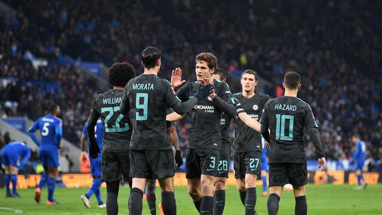 Alvaro Morata celebrates with his Chelsea team-mates after scoring against Leicester