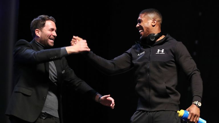 Anthony Joshua and promoter Eddie Hearn on stage during the Joshua v Parker weigh-in at the Motorpoint Arena in Cardiff