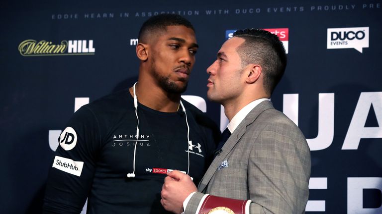 Anthony Joshua and Joseph Parker stare each other down during a press conference held at Sky Sports