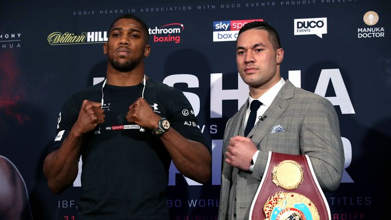 Anthony Joshua and Joseph Parker pose for photographs during their press conference held at Sky Sports on March 27, 2018