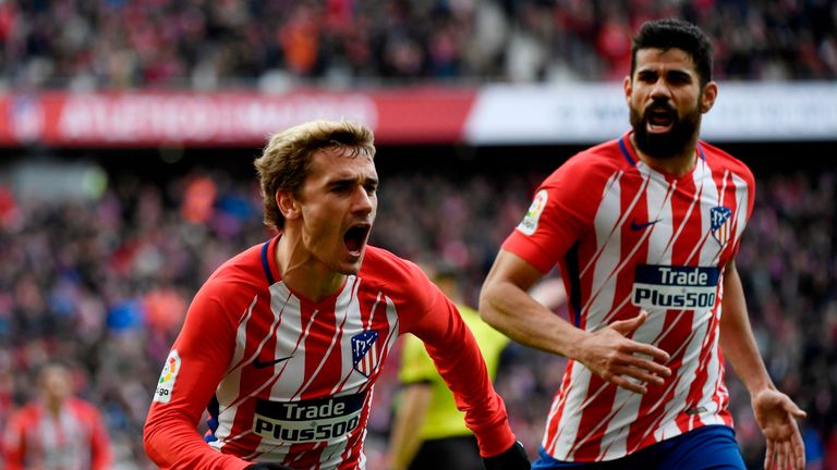 Antoine Griezmann (L) celebrates scoring with Diego Costa against Celta Vigo