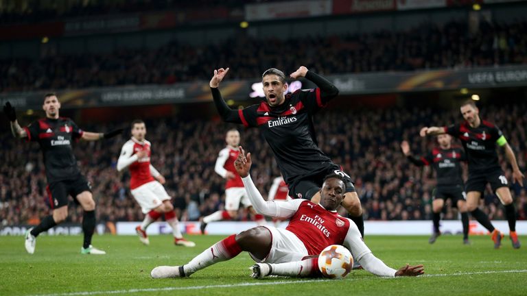 Arsenal's Danny Welbeck is fouled and wins a penalty during the UEFA Europa League round of 16, second leg match at the Emirates Stadium, London.