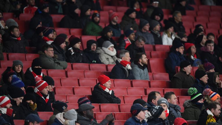 A number of empty seats can be seen during the Premier league match between Arsenal and Manchester City at the Emirates Stadium