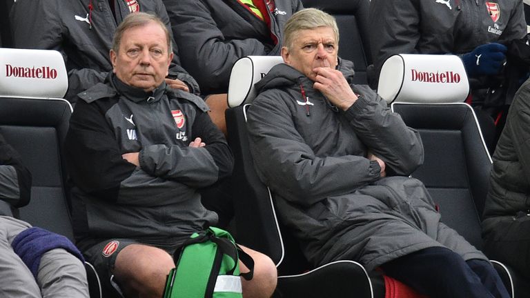 Arsene Wenger and Arsenal kit manager Vic Akers look on during the Premier League match against Brighton