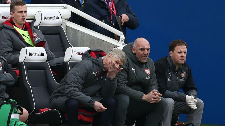 Arsene Wenger looks on dejected as his Arsenal side trail to Brighton