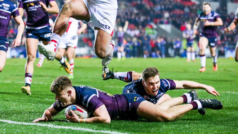 Leeds' Ash Handley scores a try against St Helens in the Betfred Super League