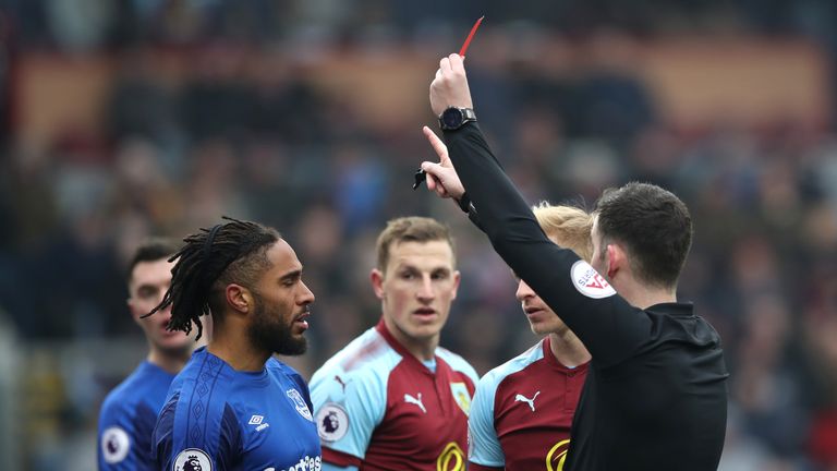 Ashley Williams is shown a red card against Burnley