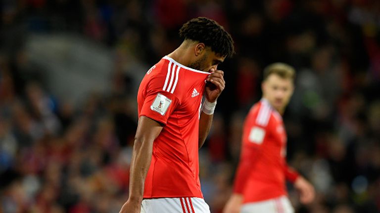 Ashley Williams of Wales looks dejected after defeat to Ireland