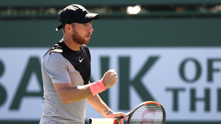 Dudi Sela celebrates after beating British No 1 Kyle Edmund on Sunday