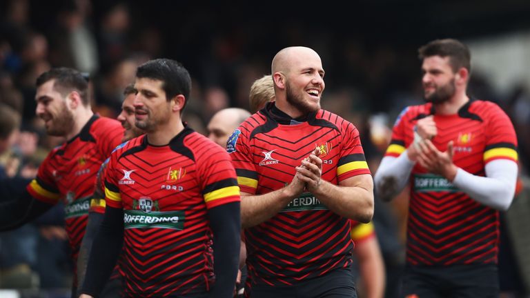 Belgium players celebrate their win over Spain in Brussels