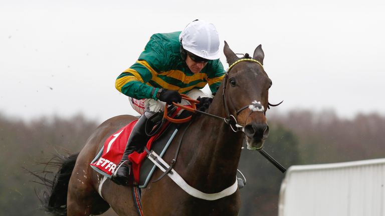 Buveur D'Air and Barry Geraghty pull away from the last flight before going on to win The Betfred 'Supports Jack Berry House' Contenders Hurdle Race during Betfred Day at Sandown Park Racecourse