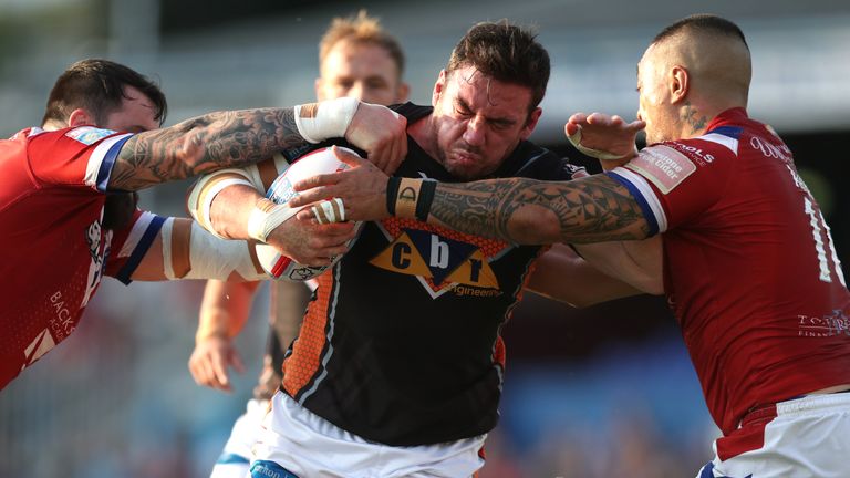 Castleford Tigers' Grant Millington is tackled during a Super League clash with Wakefield